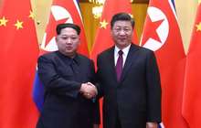 习近平同金正恩举行会谈